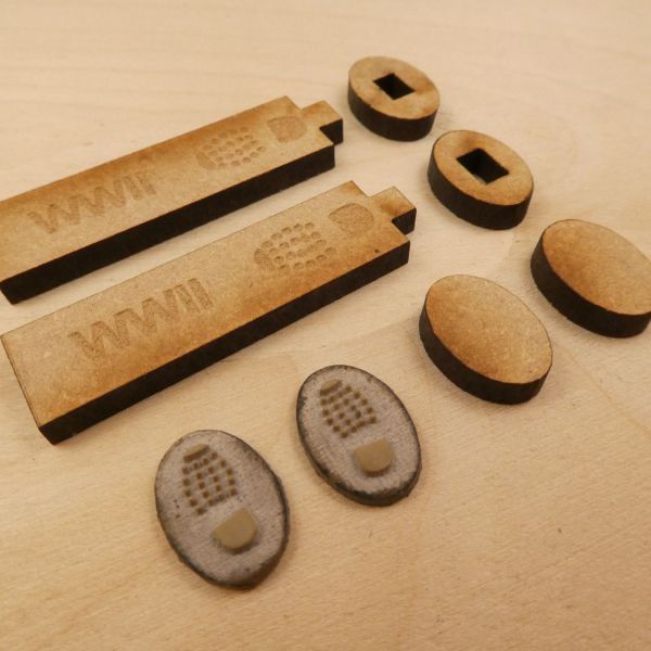 <p>This set contains lasercut parts to assemble a pair of 1:35 bootprint-stamps. Each stamp consists of a 3-part MDF handle and a rubber pad featuring a sharply cut bootprint.<br />
<br />
They work well with acrylics, enamels, pigments and oils.<br />
<br />
There are 4 different patterns available;<br />
this is pattern "WWII type B" (for Axis and Soviet forces).<br />
<br />
Use PVA-glue to assemble the MDF base,<br />
then attach the stamp to this constructed base using contact- or CA-glue.</p>
