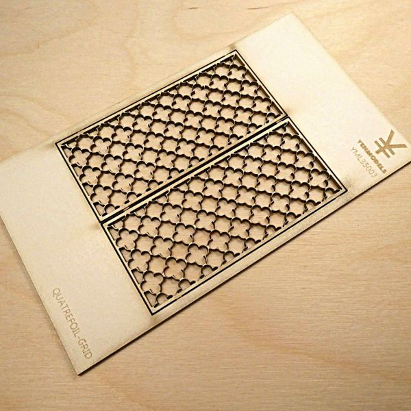 <p>This set contains 2 panels of finely laser-cut quatrefoil-patterned grid, to use as decorative iron or wooden framework, ornamental screens, balcony railings or fencing.<br />
<br />
The quatrefoil, a four-leafed ornament, was a popular motif during the Gothic and Renaissance eras and widely used in art, architecture, traditional Christian symbolism and heraldics. <br />
<br />
Material: silkboard, 1,5 mm.<br />
Plate dimensions: 115 x 65 mm.<br />
Each grid measures 66 x 30 mm.<br />
<br />
Design © : Yen Drenth.</p>
